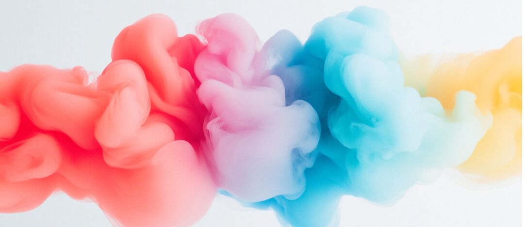 Titelbild des Innovations-Focus Geschlechtervarianz des Universitätsspitals Basel, das bunte Wolken zeigt